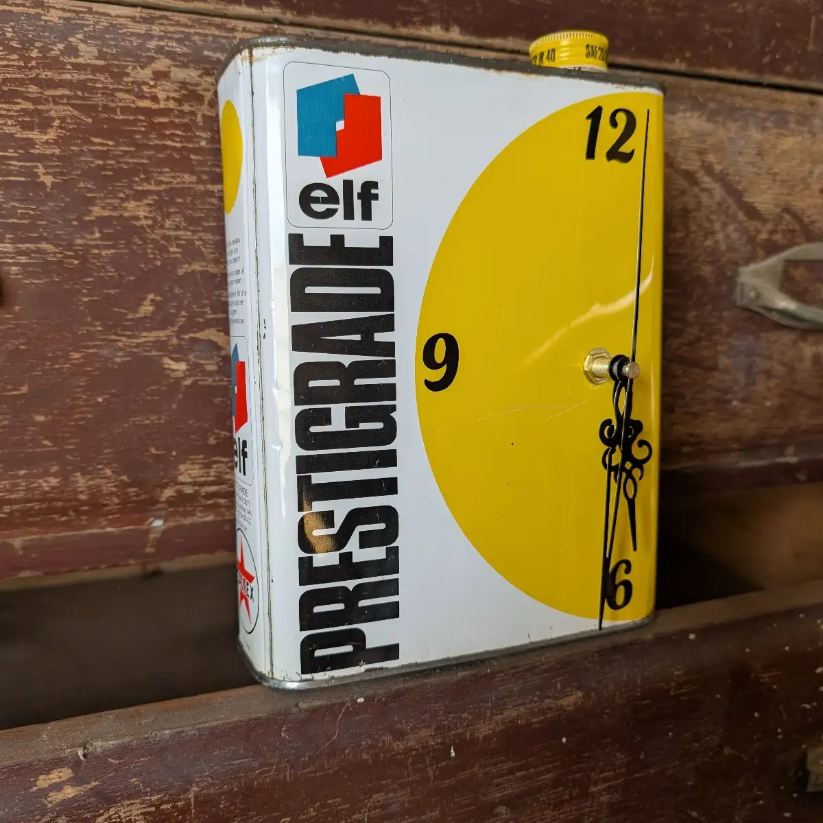Horloge bidon d huile Elf